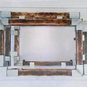 שולחן מוביוס מעץ ממוחזר צרוב, ברזל וזכוכית